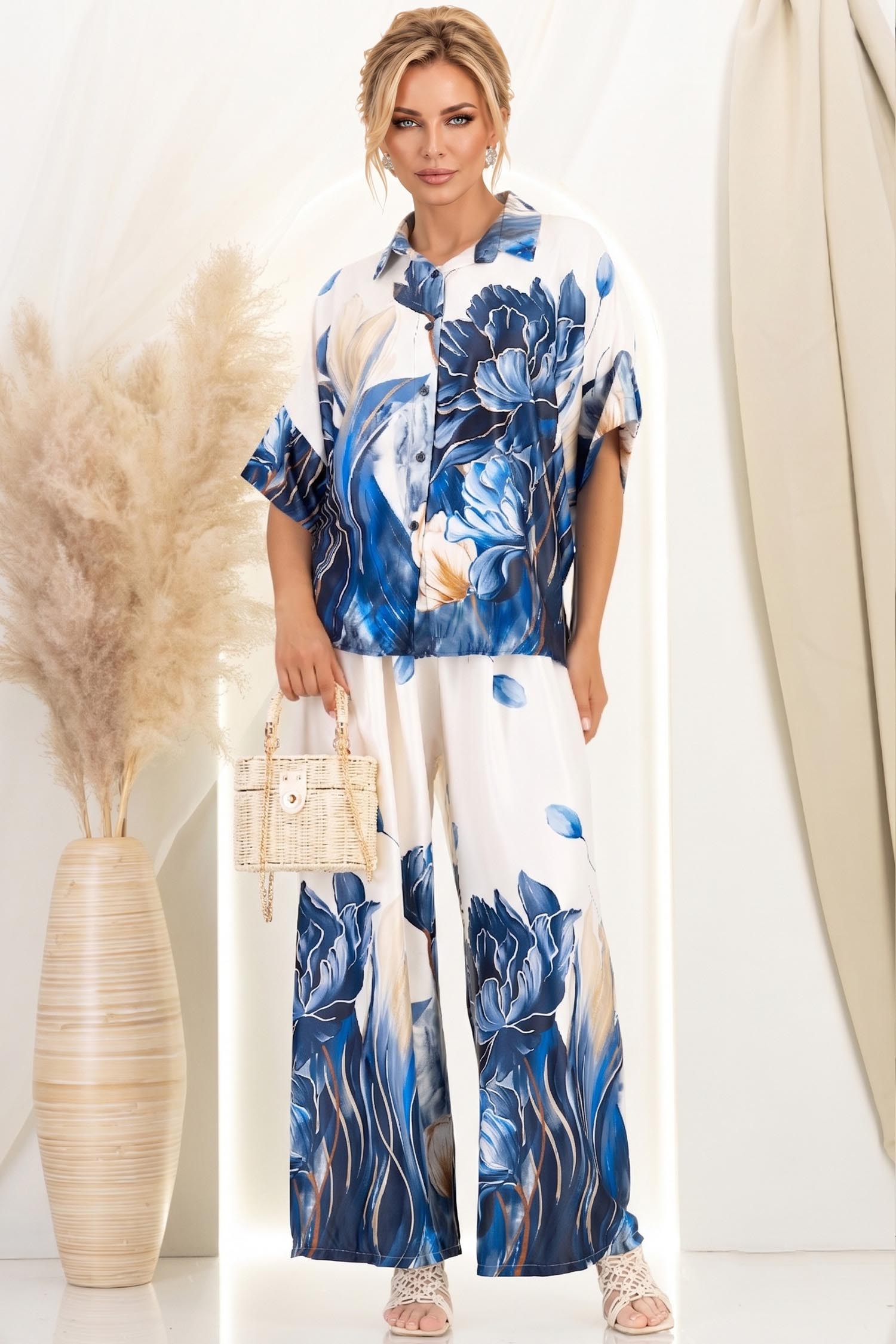 Compleu din material fluid albastru cu un croi larg si imprimeu floral 2 - StarShinerS.ro